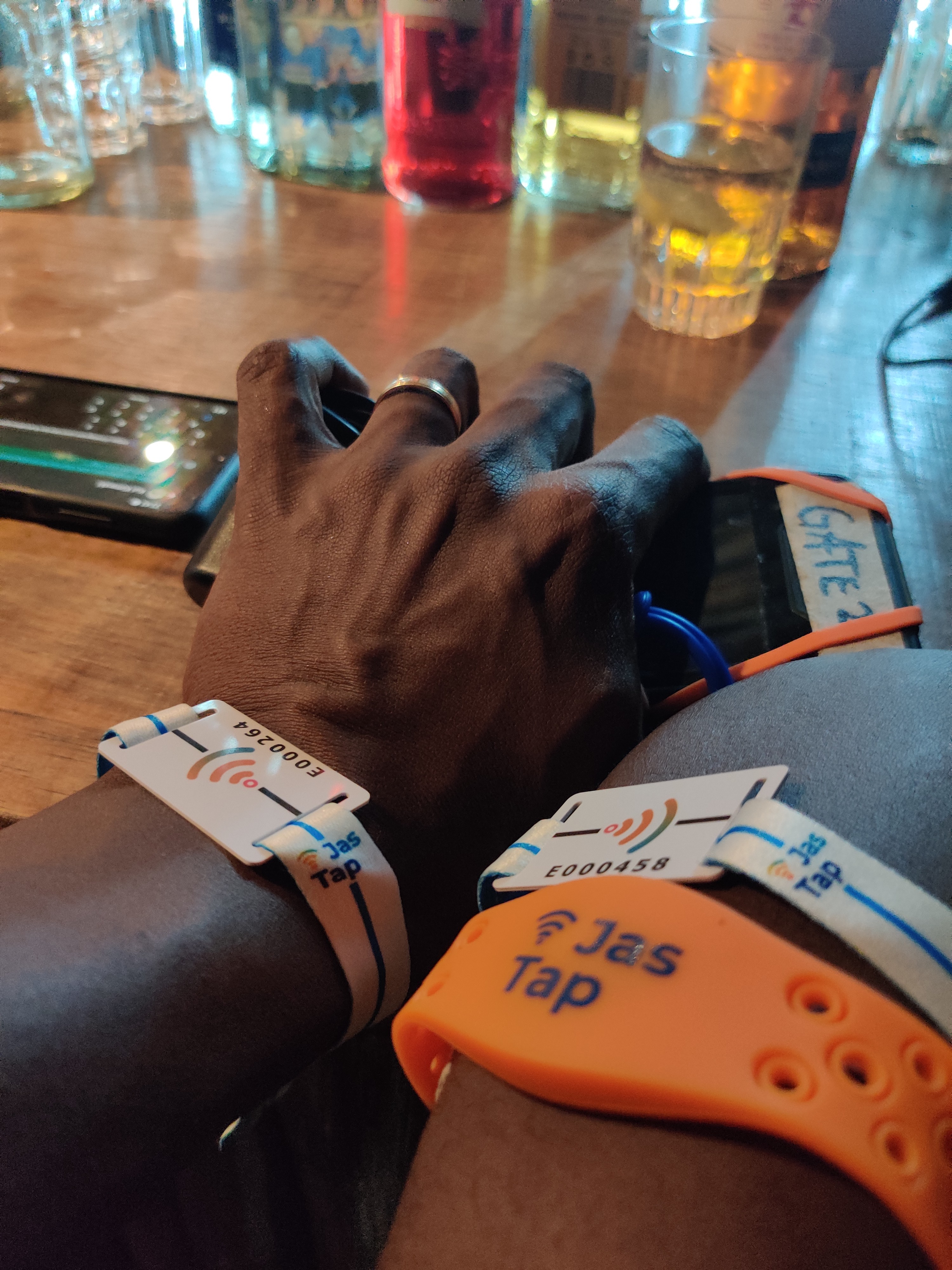 NFC tap-to-pay at a beach bar