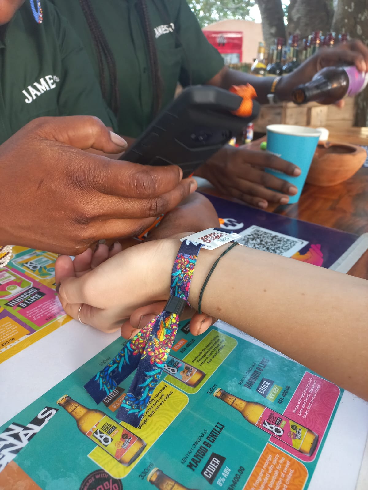 Vendor scanning a JasTap wristband